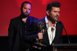 Juan Devis accepts an award at the 68th Los Angeles Area Emmys, July 23, 2016, at the Saban Media Center, North Hollywood, California. 