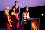 Cher Calvin and her team accept an award at the 68th Los Angeles Area Emmys, July 23, 2016, at the Saban Media Center, North Hollywood, California. 