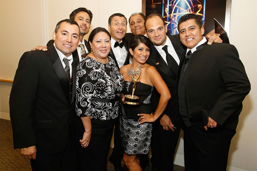 The team from KMEX celebrates at the 66th Los Angeles Area Emmy Awards.