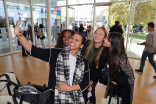 Attendees taking a selfies at Media Educators Conference