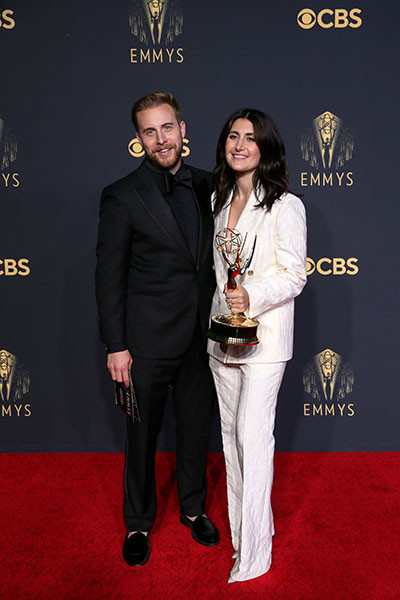 Travis Helwig and Jen Statsky on the Winner's Walk at the 73rd Emmy Awards, September 19, 2021 in Los Angeles, California. 