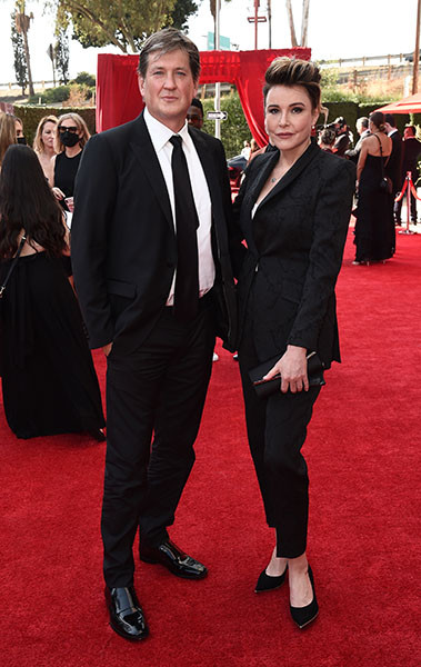 Bill Lawrence and Christa Miller arrive at the 73rd Emmy Awards, September 19, 2021 in Los Angeles, California.
