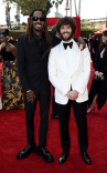Gata and Dave Burd arrive at the 73rd Emmy Awards, September 19, 2021 in Los Angeles, California.