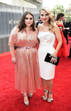 Beanie Feldstein and Annaleigh Ashford arrive at the 73rd Emmy Awards, September 19, 2021 in Los Angeles, California.