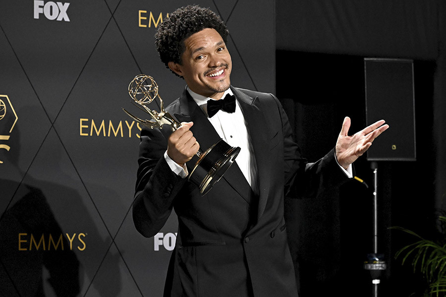 Trevor Noah from The Daily Show With Trevor Noah backstage at the 75th Emmy Awards 