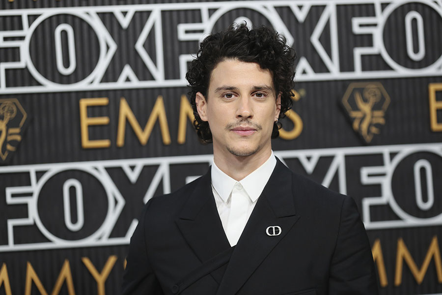 Adam DiMarco of The White Lotus on the red carpet at the 75th Emmy Awards