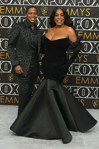 Niecy Nash-Betts from Dahmer - Monster: The Jeffrey Dahmer Story and Jessica Betts on the red carpet at the 75th Emmy Awards 