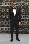 Joel McHale on the red carpet at the 75th Emmy Awards