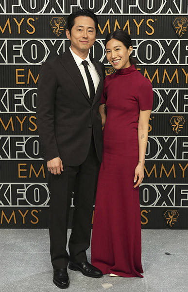 Steven Yeun of BEEF and Joana Pak on the red carpet at the 75th Emmy Awards