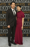 Steven Yeun of BEEF and Joana Pak on the red carpet at the 75th Emmy Awards