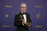 John Oliver of Last Week Tonight With John Oliver backstage with the award for Outstanding Scripted Variety Series at the 76th Emmy Awards