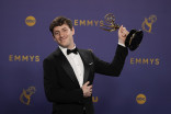 Alex Edelman of Just for Us backstage with the award for Outstanding Writing for a Variety Special for at the 76th Emmy Awards 