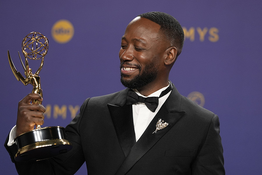Lamorne Morris of Fargo backstage with the award for Outstanding Supporting Actor in a Limited Anthology Series or Movie at the 76th Emmy Awards 
