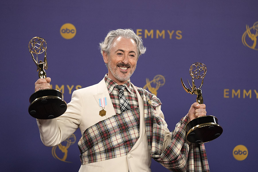 Alan Cumming of The Traitors backstage with his award for Outstanding Reality Competition Program at the 76th Emmy Awards