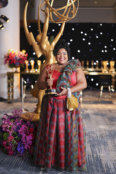 Dulce Sloan of The Daily Show with the award for Outstanding Talk Series at the 76th Emmy Awards