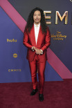 E! Entertainment GlamBOT host Cole Wallis on the red carpet at the 76th Emmy Awards