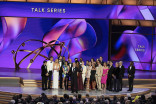 Jon Stewart and the team from The Daily Show accepts the award for Outstanding Talk Series at the 76th Emmy Awards