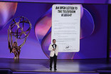 John Leguizamo presents onstage at the 76th Emmy Awards 