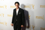 R.J. Mitte arrives at the Montage Beverly Hills for the 2014 Performers Peer Group Primetime Emmy nominee reception.