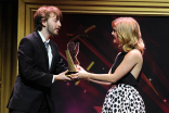 Rose McIver presents an award to Zach Ehrlich at the 36th College Television Awards at the Skirball Cultural Center in Los Angeles, California, April 23, 2015.