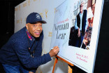 Russell Simmons signs in at An Evening with Norman Lear at the Moltalban Theater in Hollywood.