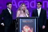 John McDonald, Echo Wu, and Kal Athannassov accept an award on stage at the 38th College Television Awards presented by the Television Academy Foundation at the Saban Media Center on Wednesday, May 24, 2017, in the NoHo Arts District in Los Angeles. 