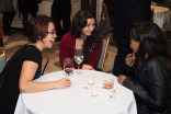 Stephanie Hui and Jenna Hellmuth chat with a friend at the New York Networking Night Out, November 13, 2015 at the St. Regis in New York City.