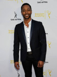 Actor Thomas Hobson arrives at Dynamic and Diverse: A 66th Emmy Awards Celebration of Diversity at the Television Academy in North Hollywood, California.