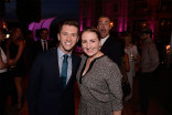 Travis Wall and Mandy Moore pose for a photo as Derek Hough photobombs at the 2015 Choreography Nominee Reception, August 30, 2015, at the Montage in Beverly Hills.